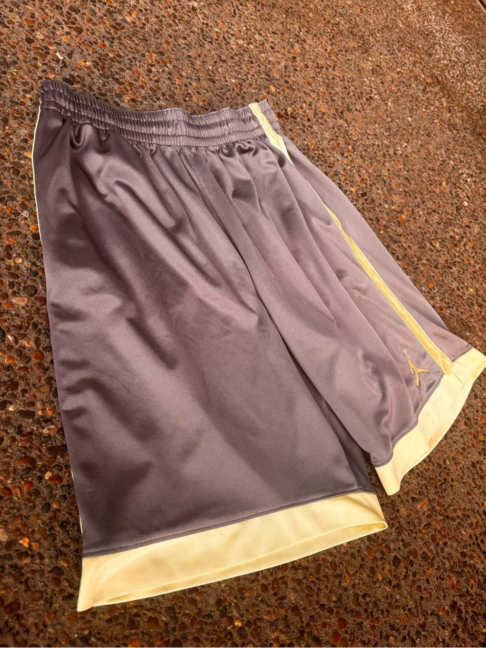 Jordan Men’s Purple Athletic Shorts with Gold Accents